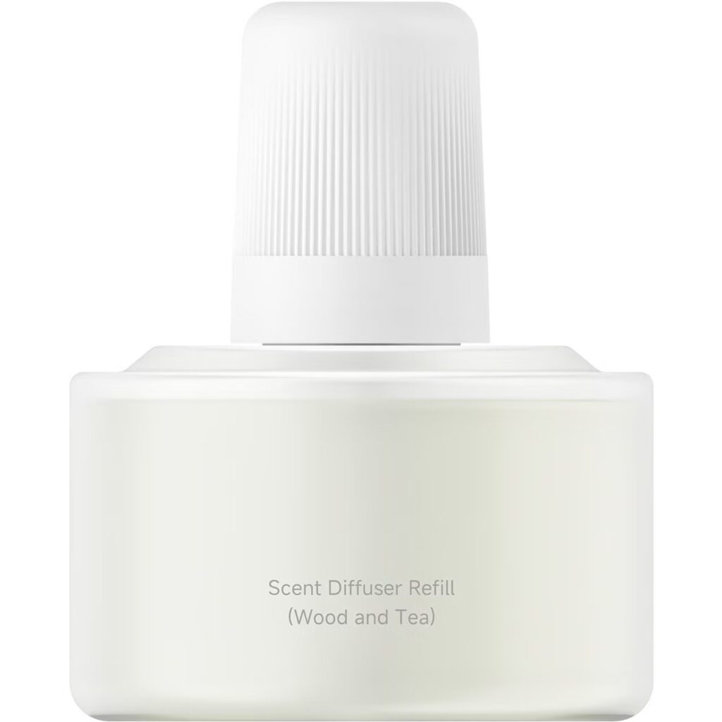 بطری اسانس خوشبو کننده smart scent در کنار دستگاه دیفیوزر شیائومی