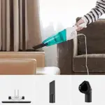 ظاهر جمع‌وجور جاروبرقی دستی شیائومی Deerma DX118C روی میز